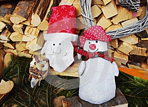 Santa Clouse toys in Dolomity mountains, winter image