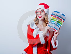 Santa Clous girl with eyeglasses and Sandales