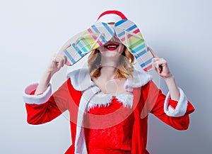 Santa Clous girl with eyeglasses and Sandales