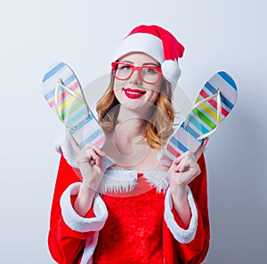 Santa Clous girl with eyeglasses and Sandales