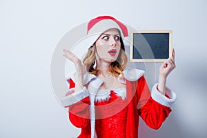 Santa Clous girl in red clothes board