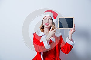 Santa Clous girl in red clothes board