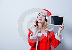 Santa Clous girl in red clothes board