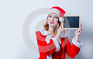 Santa Clous girl in red clothes board