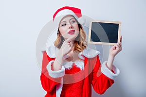 Santa Clous girl in red clothes board