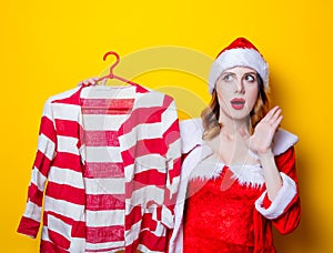 Santa Clous girl in red clothes with shirt