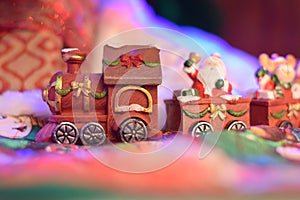 Santa Clous train bringing presents in a fairytale village
