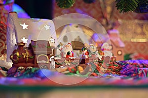 Santa Clous train bringing presents in a fairytale village