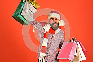 Santa with colorful packets. Black Friday sale concept.