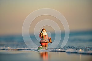 Santa copy space. Holiday greeting card. Happy New Year and merry Christmas travel, tropical vacations concept.