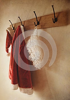 Santa costume hanging on coat rack