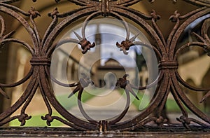 Santa Croce Basilica Pazzi Chapel through ornate gate metalwork, Florence, Italy photo