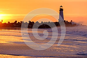 Santa Cruz Breakwater Light Walton Lighthouse at sunrise photo