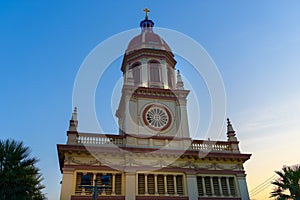 Santa Cruz Church illuminated at twilight , Historic Thai-Portuguese Neighborhood Dating Back to the Ayutthaya Period, in Bangkok