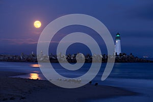 Santa Cruz harbor lighthouse by night photo