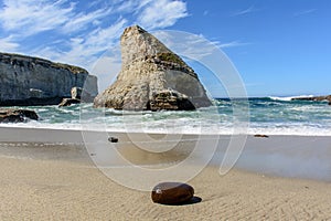 Santa Cruz Shark Fin Cove with Stone on Beach