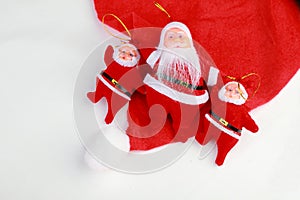 Santa dolls on a white background