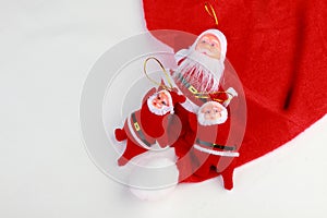 Santa dolls on a white background