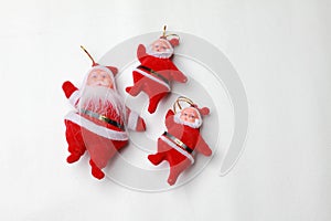 Santa dolls on a white background