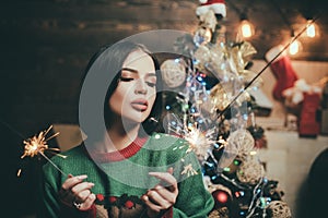 santa dominatrix woman posing on vintage background. Christmas gift. Christmas fashion. Costume party concept