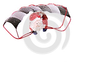 Santa flying on a parachute