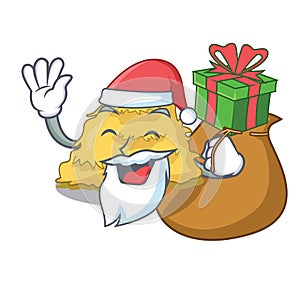 Santa with gift hay bale mascot cartoon