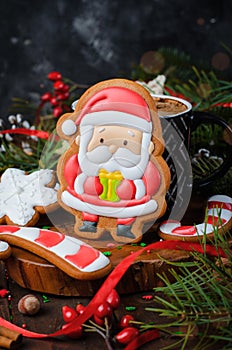 Santa Gingerbread Cookie on Wooden Background, Christmas Treat
