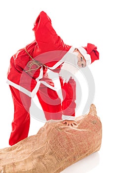 Santa Girl with Backache through too much presents, isolated on