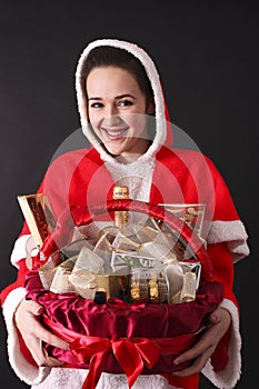 Santa girl gives us a Christmas gift basket