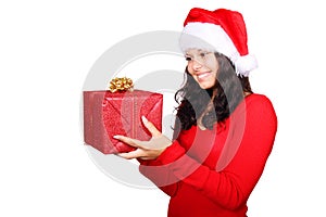 Santa girl looking at christmas gift