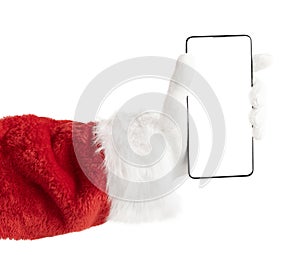 Santa hand holding phone with empty screen. Isolated with clipping path