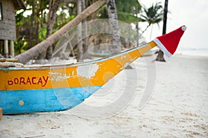 Santa hat on boat nose on Boracay