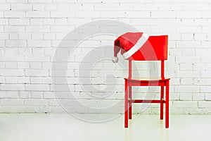 Santa hat on a chair.
