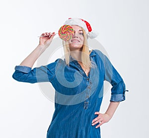 Santa hat woman holding a lollipop in white screen