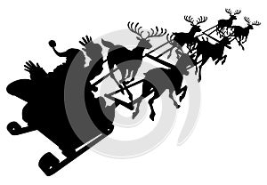 Santa in his Christmas sled or sleigh silhouette photo