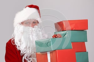 Santa holding christmas presents