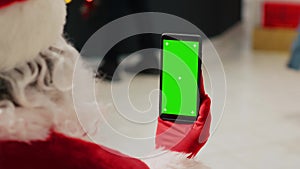 Santa holding chroma key phone