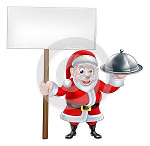 Santa Holding Dinner and Sign