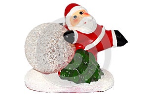 Santa leaning on the globe on