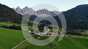 Santa Maddalena Magdalena village with majestic Gruppo delle Odle mountain range in the background, Val di Funes valley,