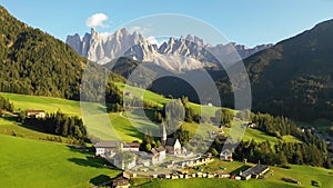 Santa Maddalena Magdalena village with majestic Gruppo delle Odle mountain range in the background, Val di Funes valley,