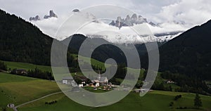 Santa Maddalena Magdalena village with majestic Gruppo delle Odle mountain range in the background, Val di Funes valley,