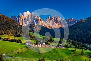 Santa Maddalena (Santa Magdalena) village with magical Dolomites mountains in background, Val di Funes valley, Trentino Alto Adige