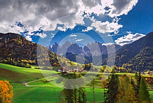 Santa Maddalena village with Dolomites mountains in background