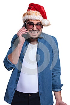 Santa man is receiving bad news on his phone
