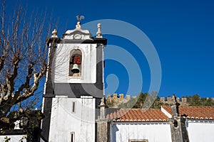 Santa Maria church in Obidos, in front of the castle of the stonewalled ancient city