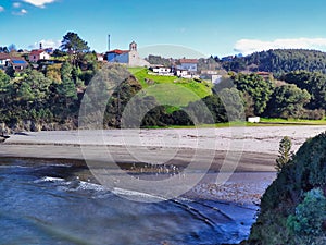 Santa Maria del Mar beach and village, Catrillon municipality, Asturias, Spain photo