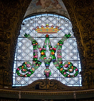 Stained glass in the Church of Santa Maria dell`Orto, in Rome, Italy. photo