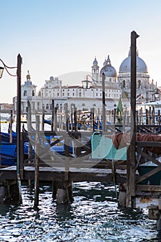 Santa Maria della Salute basilica with gondolas on the Grand can