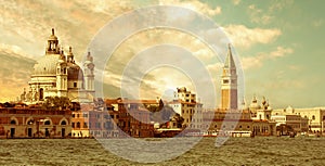 Santa Maria della Salute Basilica and St. Mark`s campanile in Venice, Italy